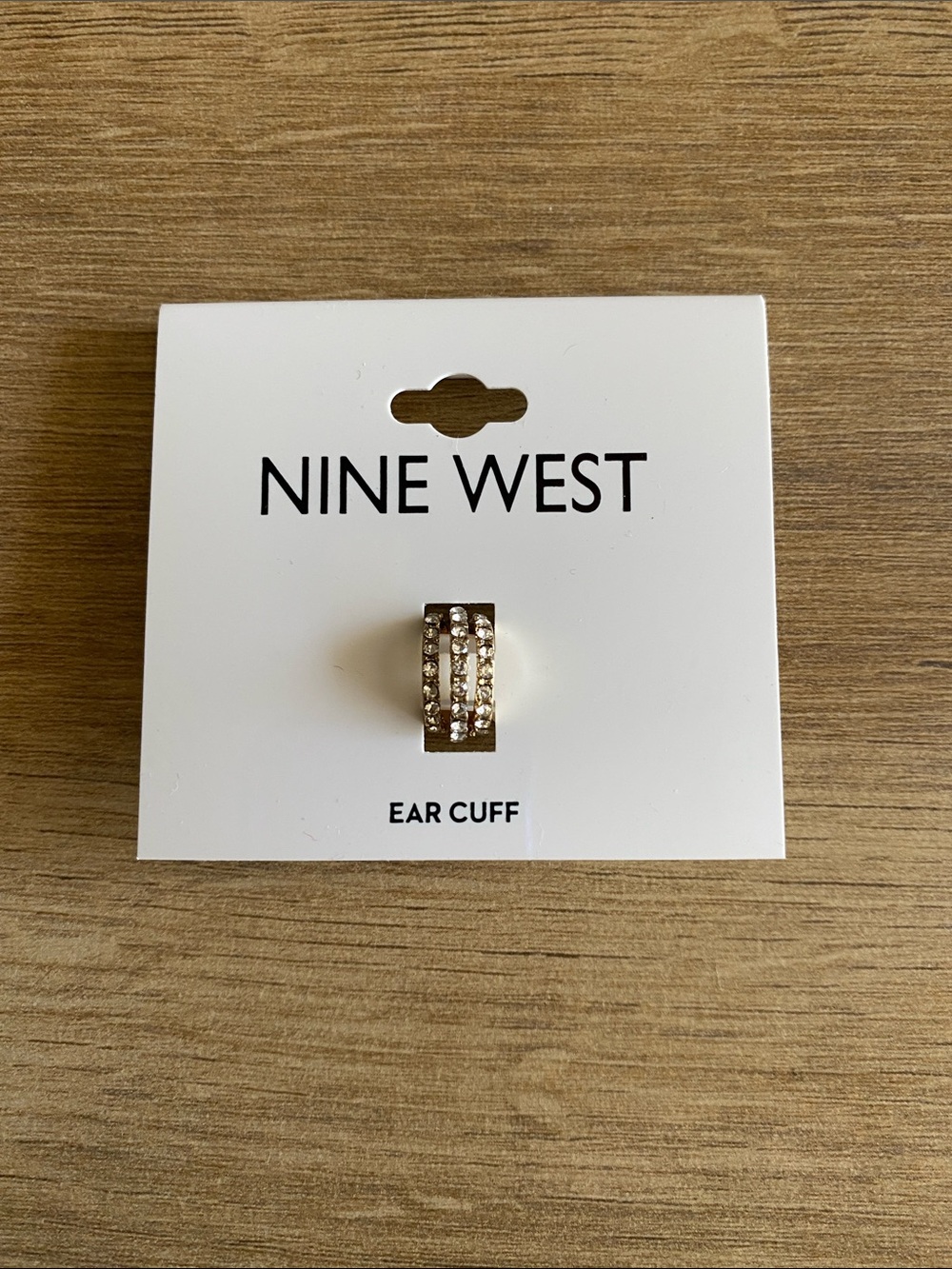 Nine West Gold colored single ear cuff